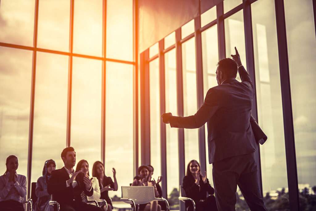 leader speaker to business group